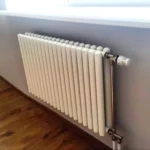 КЗТО Гармония С40 — трубчатые радиаторы 558×701, 14 секций